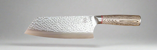 Rugged stainless steel Bunka chef knife with pakka wood handle.