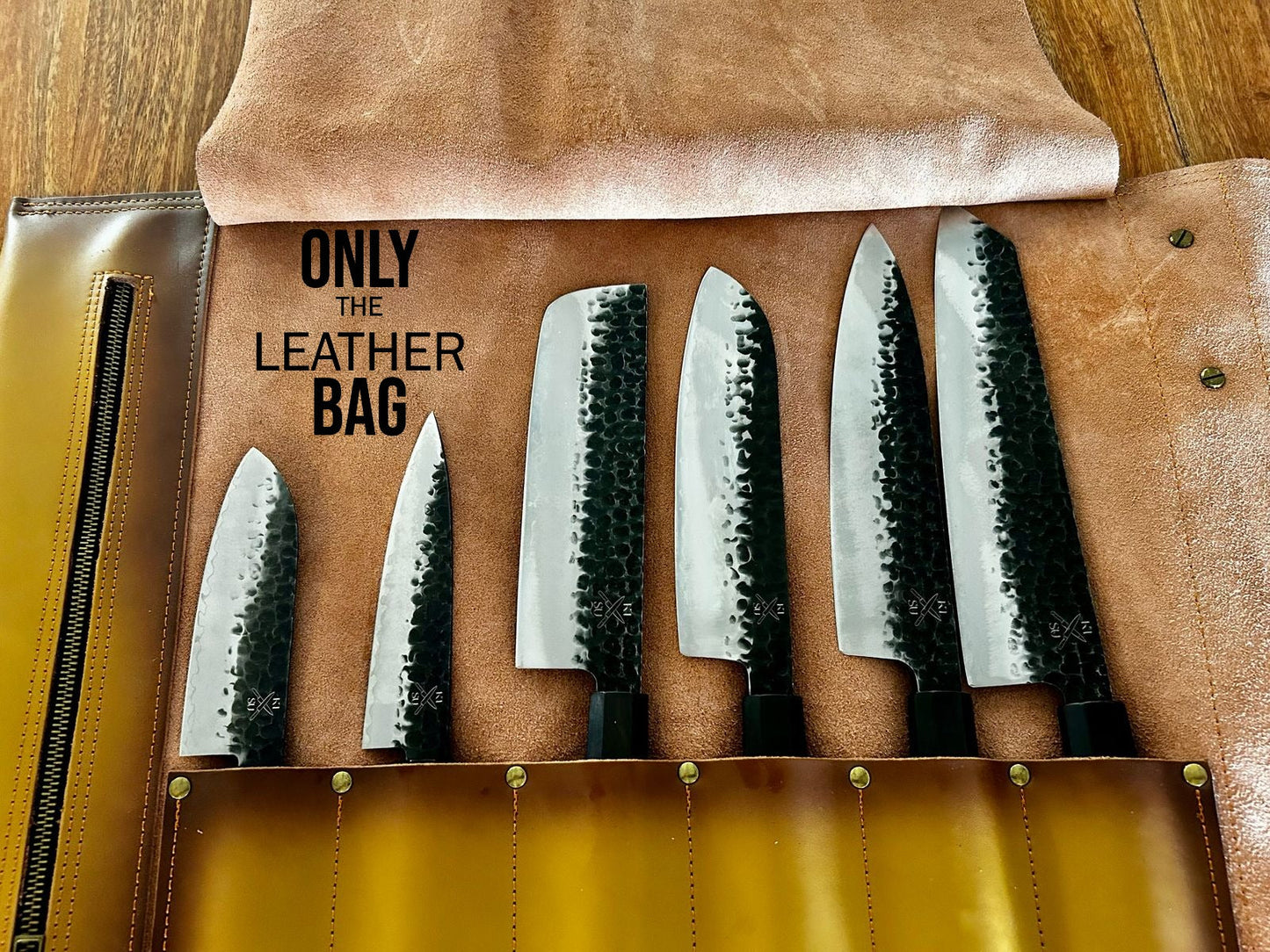 Handcrafted leather knife rolling bag with multiple pockets displaying knives, showcasing craftsmanship and durability.