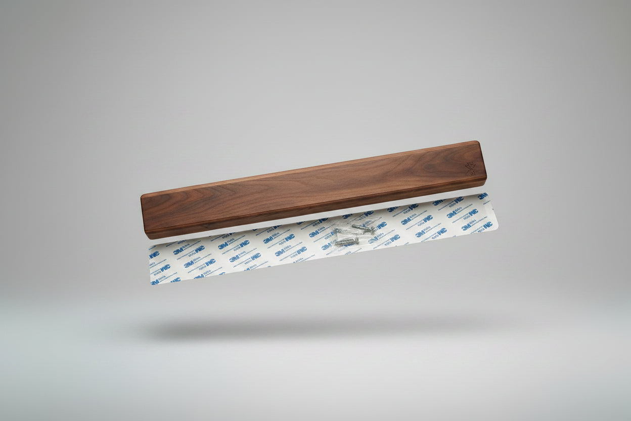 Wooden strip with 3M tape on a wooden surface