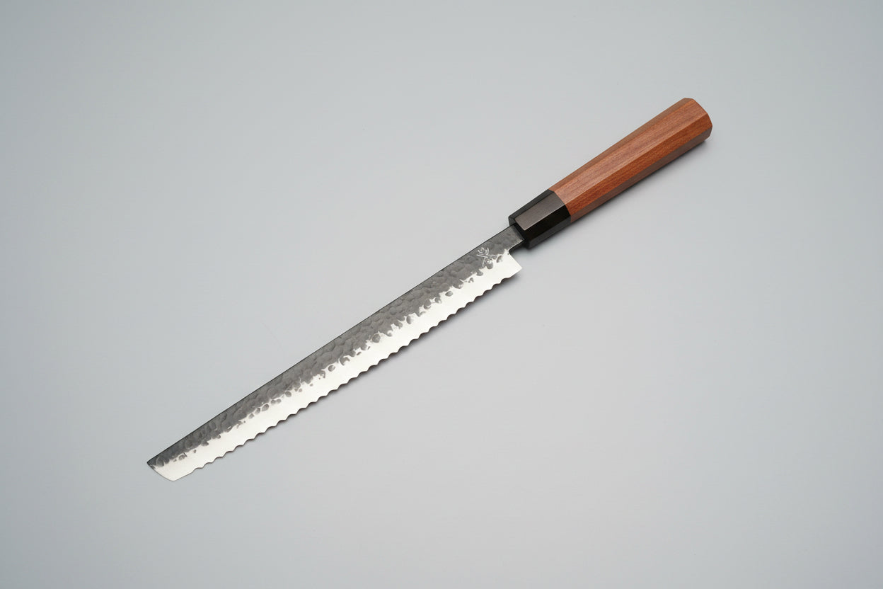 Wooden-handled knife on a wooden surface