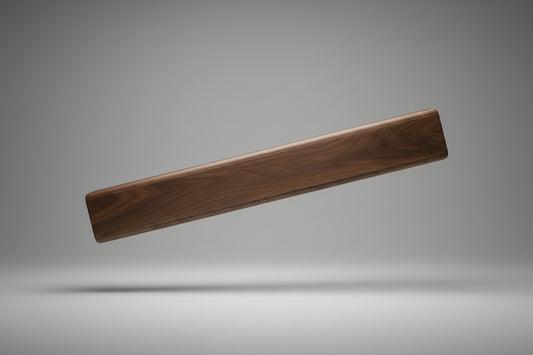 Wooden handle with a logo on a wooden surface