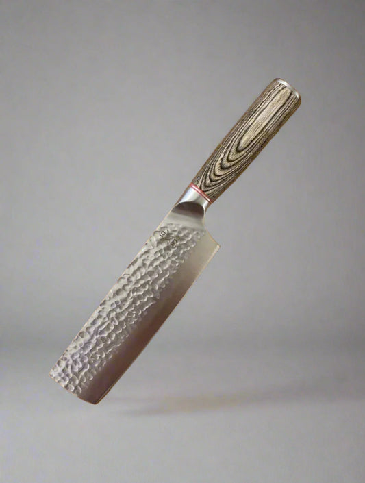 Rugged Stainless Steel Nakiri knife with hammer-forged blade and Pakka wood handle.